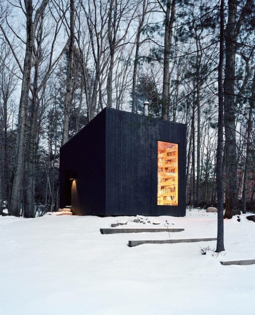 One room cube cabin in the woods