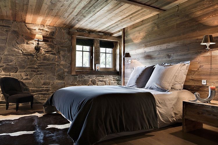 cozy stone and wood bedroom