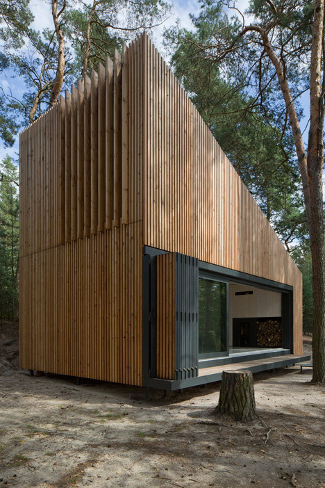 small modern wood sided cabin