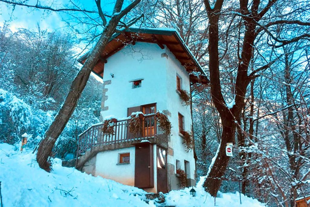 tiny house snowy tower cabin